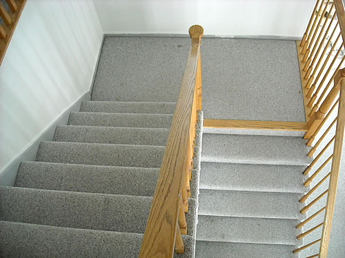 stairs before with berber carpet