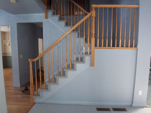 carpeted stairs before painting
