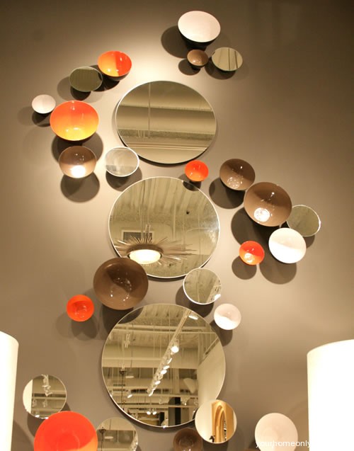 bowls mirrors and plates as wall art