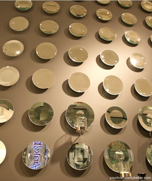bowls mirrors and plates as wall art