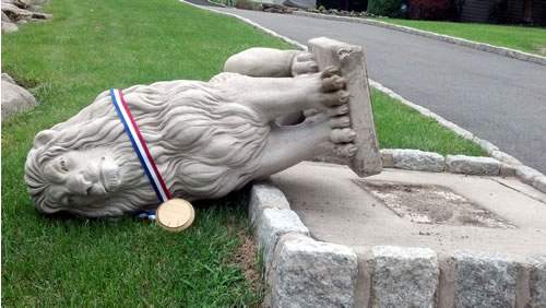 lion statues tipped over