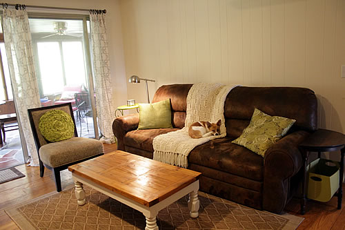 family room after move in and painted paneling