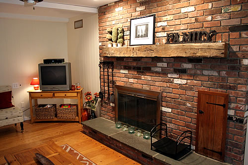 brick fireplace in family room