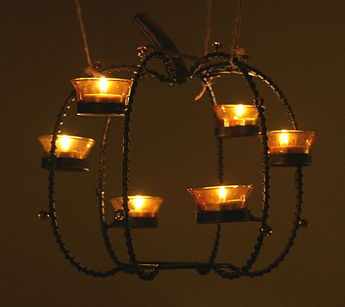 hanging pumpkin centerpiece at night