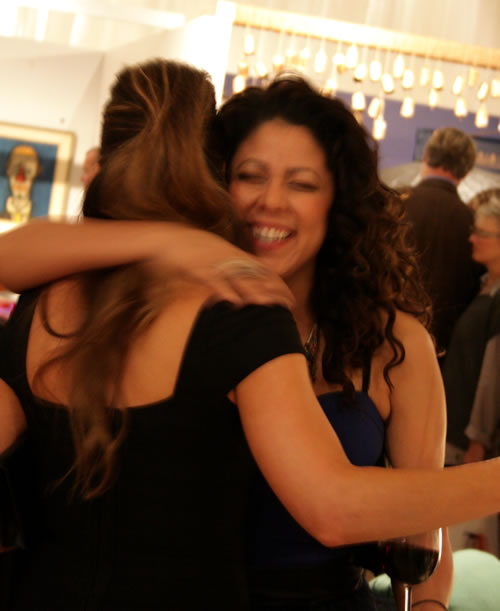 Sabrina Soto and Evette Rios hugging at design on a dime