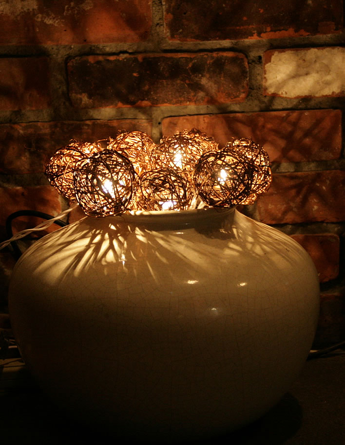 holiday string lights and grape orbs in a pot #diy #decor #yourhomeonlybetter