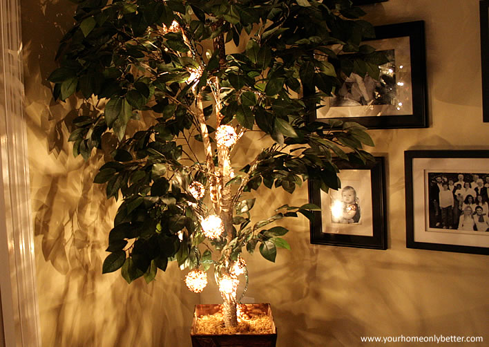 holiday string lights in trees and plants #diy #decor #yourhomeonlybetter