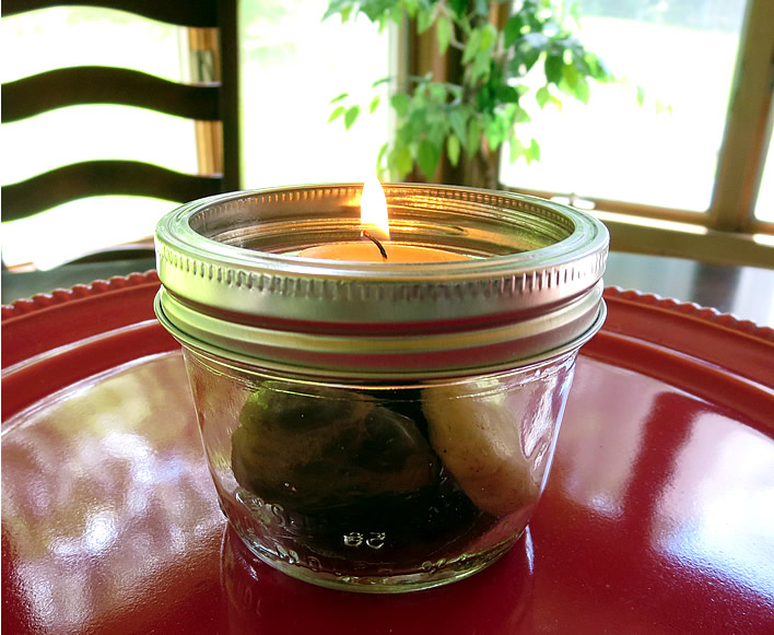mason jar with river stones and candle #NaturallyAmazing